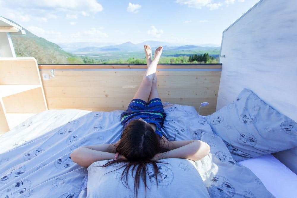This tiny house produced in the Alps opens up to the skies