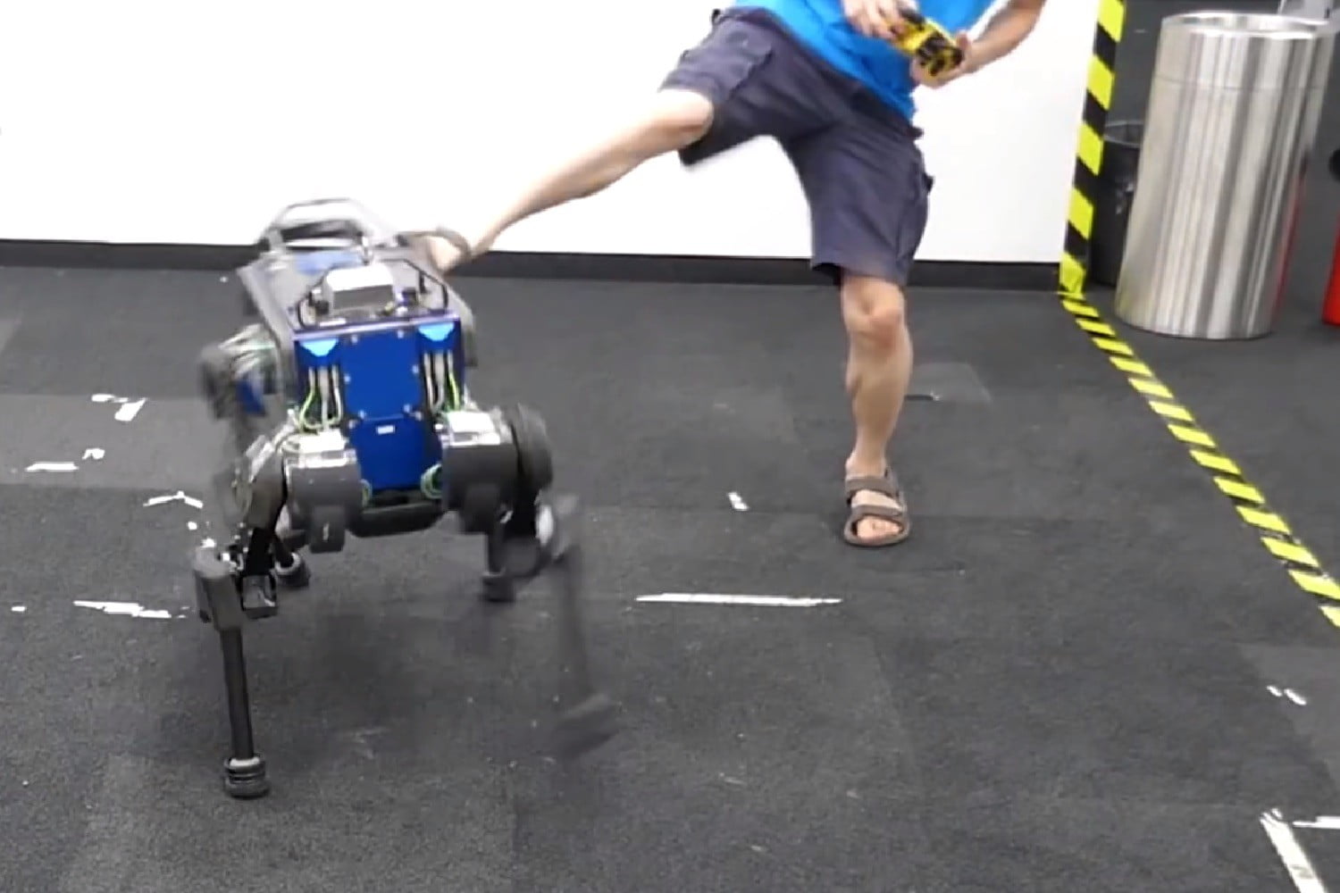 ANYmal dog robot can get back on its feet when someone pushes it over